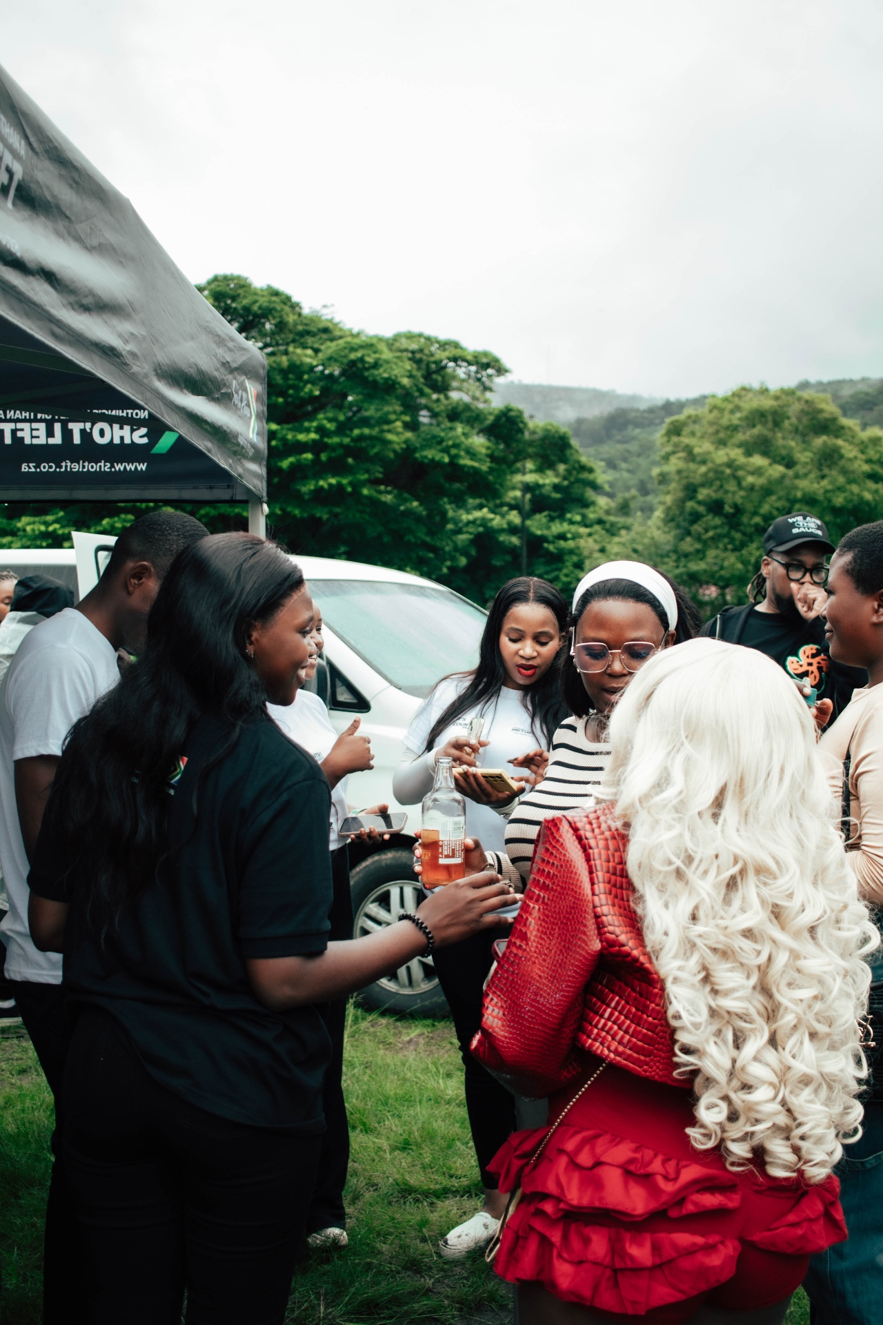 Crowd gathered at the Sho't Left activation against the Wild Coast hills