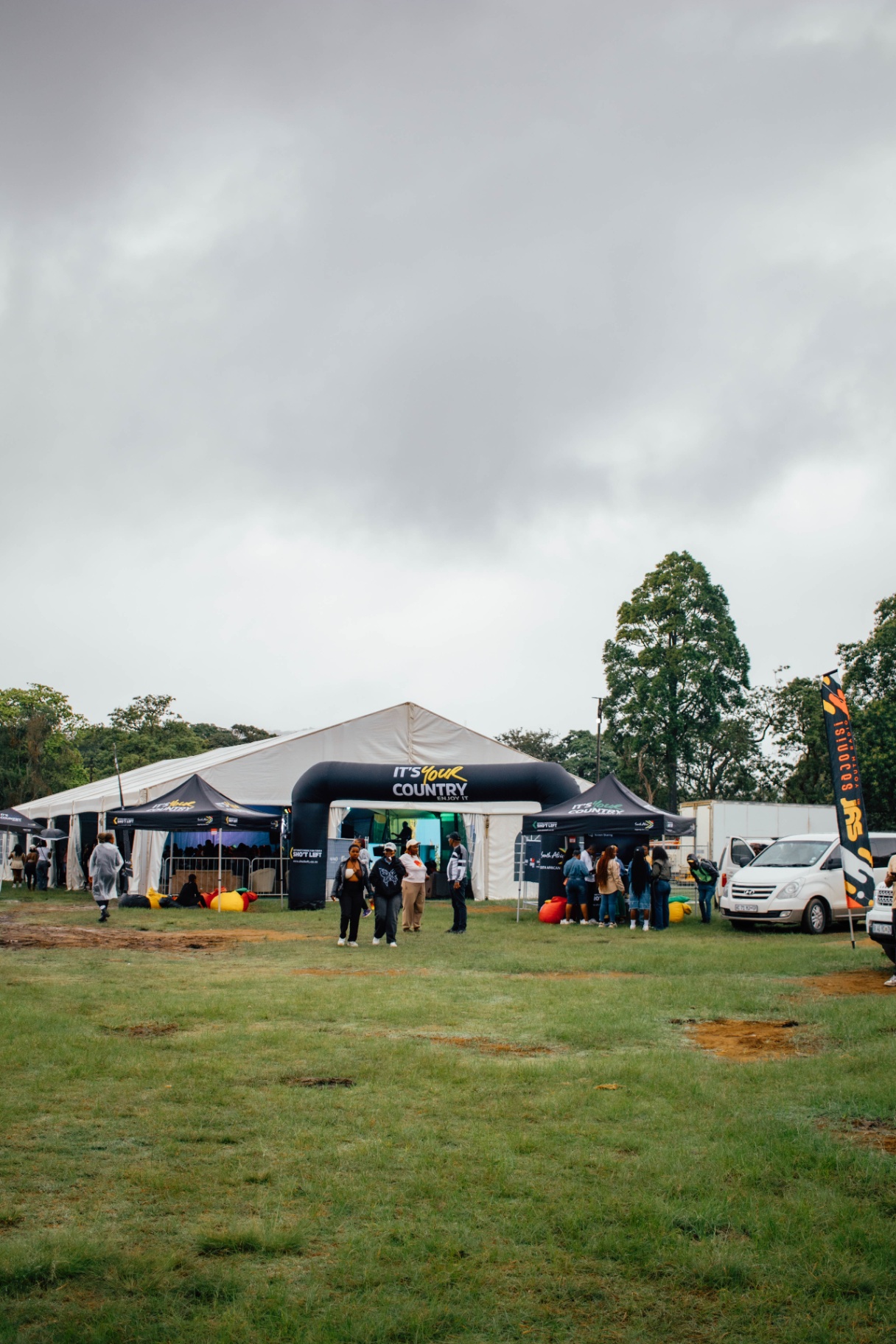Main festival tent and activation against a moody sky