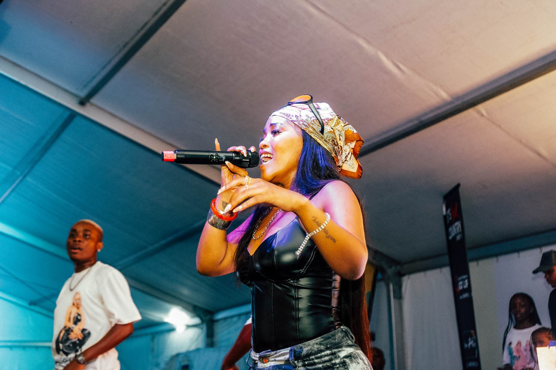 Close-up of singer holding the mic